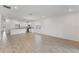 Spacious living area with a modern, open-concept design and tile flooring at 2292 Sirena Ln, Mount Dora, FL 32757