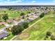 Scenic view of a residential area with lush greenery and golf course at 2520 Nw 53Rd Avenue Rd, Ocala, FL 34482