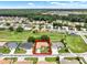 Highlighted aerial view of a home with mature landscaping in a vibrant community at 2520 Nw 53Rd Avenue Rd, Ocala, FL 34482