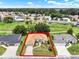 Highlighted aerial view of a home with mature landscaping in a vibrant community at 2520 Nw 53Rd Avenue Rd, Ocala, FL 34482