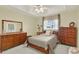 This bedroom features natural light, neutral colored walls, and furnishings, creating a peaceful atmosphere at 2520 Nw 53Rd Avenue Rd, Ocala, FL 34482