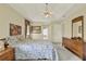 The main bedroom is large with neutral decor and lots of space for a dresser and nightstands at 2520 Nw 53Rd Avenue Rd, Ocala, FL 34482