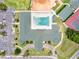 Aerial view of a community pool with ample seating, perfect for relaxing and enjoying the sunny weather at 2520 Nw 53Rd Avenue Rd, Ocala, FL 34482