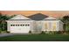 Charming single-story home featuring a two-car garage, neutral paint, and well-manicured lawn at 2757 Redblush Ter, St Cloud, FL 34772