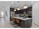 Spacious kitchen with a large island, bar seating, and stainless-steel appliances for the home chef at 2757 Redblush Ter, St Cloud, FL 34772