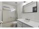 Clean bathroom with a shower-tub combination, modern vanity, and a sleek, updated mirror at 2908 Lee Shore Loop, Orlando, FL 32820