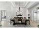 Formal dining area featuring a large table, stylish lighting, and neutral decor at 2908 Lee Shore Loop, Orlando, FL 32820