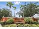 Elegant entrance to Country Lakes Estates, showcasing lush landscaping and a welcoming community atmosphere at 2908 Lee Shore Loop, Orlando, FL 32820