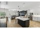Open-concept kitchen with a large island, modern appliances, and connected living spaces at 2908 Lee Shore Loop, Orlando, FL 32820