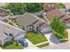 Aerial view showcases the property's curb appeal, well-maintained landscaping, and neighborhood setting at 2913 Wilshire Rd, Clermont, FL 34714