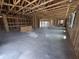 Framed interior showcasing an open floor plan and unfinished concrete flooring at 30124 Misty Pines Road, Mount Dora, FL 32757