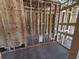 Laundry room with framed walls and pre-installed plumbing, ready for appliances at 30124 Misty Pines Road, Mount Dora, FL 32757