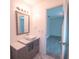 A stylish bathroom featuring a vessel sink, modern vanity, and updated fixtures at 3149 Quail Dr, Deltona, FL 32738