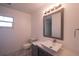 Bathroom featuring a modern vanity with vessel sink, decorative mirror and updated lighting at 3149 Quail Dr, Deltona, FL 32738