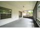 Covered patio with view to the backyard and privacy screens at 3149 Quail Dr, Deltona, FL 32738