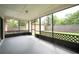 Relaxing screened patio with view of the backyard and privacy at 3149 Quail Dr, Deltona, FL 32738