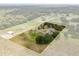Acreage property featuring main residence, guest house and lush green grass at 3201 Oaklea Dr, Deland, FL 32720