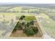 Estate aerial view with mature landscaping including large trees and winding driveway at 3201 Oaklea Dr, Deland, FL 32720