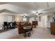 Finished basement area with comfortable seating, a game table, and neutral carpeting at 3201 Oaklea Dr, Deland, FL 32720