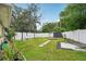 Large fenced backyard with plenty of space for outdoor activities and entertaining, including a fire pit at 3312 Se 6Th St, Ocala, FL 34471
