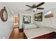 Compact bedroom with built-in bed, desk, and a modern ceiling fan for added comfort at 3312 Se 6Th St, Ocala, FL 34471