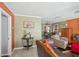 Open-concept living space showcasing neutral tones and cozy furniture at 3312 Se 6Th St, Ocala, FL 34471