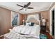 Comfortable main bedroom with a beautiful bed, stylish decor, and warm, inviting colors at 3312 Se 6Th St, Ocala, FL 34471