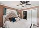 Inviting main bedroom with a spacious layout, elegant furniture, and view into the en-suite bathroom at 3312 Se 6Th St, Ocala, FL 34471