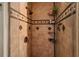 Elegant tiled shower with multiple shower heads and convenient shelving; a luxurious bathing experience at 3312 Se 6Th St, Ocala, FL 34471