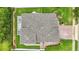 Birds-eye view of property displaying roof, yard, deck, and brick driveway at 405 Courtlea Park Dr, Winter Garden, FL 34787