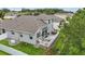 Spacious backyard featuring an outdoor deck with dining and lounge seating at 405 Courtlea Park Dr, Winter Garden, FL 34787