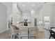 Well-equipped kitchen featuring stainless steel appliances, light countertops, and ample cabinet space at 405 Courtlea Park Dr, Winter Garden, FL 34787