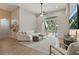 Inviting living room with balcony access, comfortable seating, and modern decor at 405 Courtlea Park Dr, Winter Garden, FL 34787