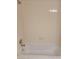 Tub and shower combination with white tile surround and chrome hardware at 4371 Aqua Vista Dr # G, Orlando, FL 32839