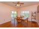 Charming dining room featuring bright natural light and exterior view at 4642 Waterside Pointe Cir, Orlando, FL 32829