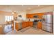 Well-lit kitchen featuring stainless steel appliances and lots of storage at 4642 Waterside Pointe Cir, Orlando, FL 32829