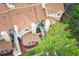 Aerial view of the townhouse with a balcony and lovely landscaping at 620 Glenwood Ct # 79, Altamonte Springs, FL 32714