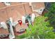 Aerial view of the townhouse with a balcony and lovely landscaping at 620 Glenwood Ct # 79, Altamonte Springs, FL 32714