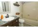 Cozy bathroom featuring tiled floors, updated vanity with mosaic countertop, tub and shower combo at 620 Glenwood Ct # 79, Altamonte Springs, FL 32714