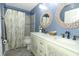 Beautiful bathroom showcasing a double vanity, decorative mirrors, shower and tub combo at 620 Glenwood Ct # 79, Altamonte Springs, FL 32714