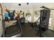 A well-equipped fitness center, complete with modern machines and motivational murals, provides a convenient workout space at 620 Glenwood Ct # 79, Altamonte Springs, FL 32714