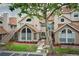 Inviting townhome exterior boasting manicured landscaping and a charming facade at 620 Glenwood Ct # 79, Altamonte Springs, FL 32714