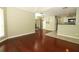 Open-concept living and dining area with hardwood floors and sliding glass doors to the outside at 620 Glenwood Ct # 79, Altamonte Springs, FL 32714