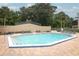 View of swimming pool with lounge chairs and pool equipment at 620 Glenwood Ct # 79, Altamonte Springs, FL 32714