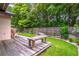 Relaxing backyard features a wood deck and a lush green lawn at 638 Boniview Ln, Altamonte Springs, FL 32714