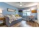 Comfortable bedroom with daybed, desk, and wood floors, perfect as a guest room or home office at 638 Boniview Ln, Altamonte Springs, FL 32714