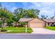 Charming single-story home featuring a well-manicured lawn and a two-car garage, nestled in a serene neighborhood at 638 Boniview Ln, Altamonte Springs, FL 32714