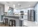 Beautiful updated kitchen with granite countertops, stainless steel appliances, and a center island with bar seating at 638 Boniview Ln, Altamonte Springs, FL 32714