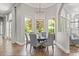 Breakfast nook with a modern light fixture and backyard views at 685 Mayo Ave, Maitland, FL 32751
