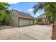 Spacious three-car garage with ample parking space and well-maintained landscaping in a quiet neighborhood at 685 Mayo Ave, Maitland, FL 32751